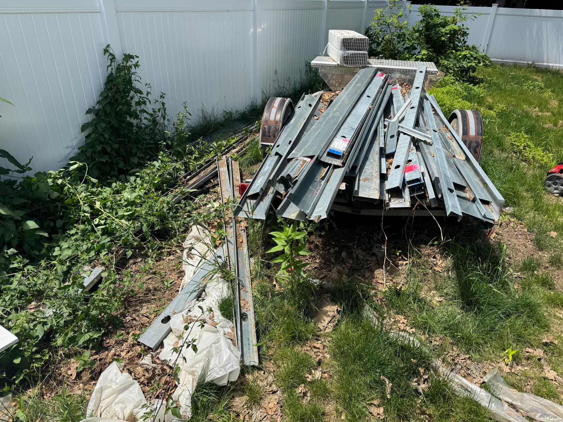 Gallery photos for Pelham NH Backyard Construction Debris Cleared Out: Image #2