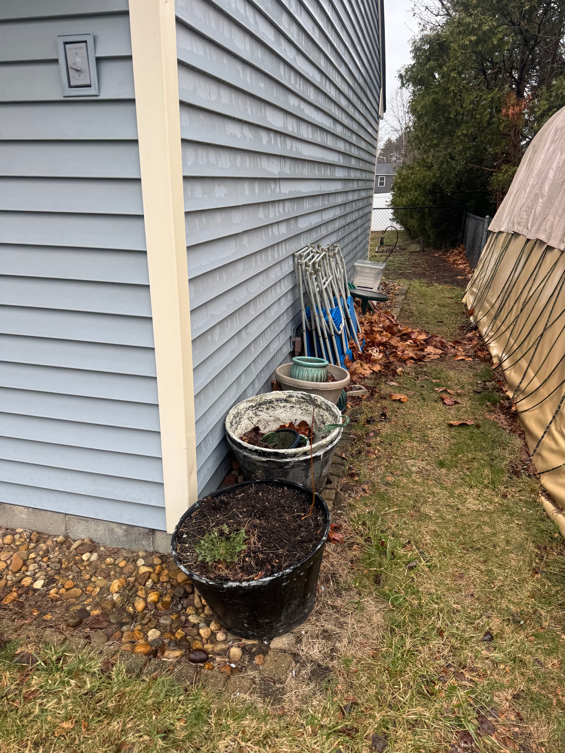 Outdoor Cleanout Clears Tires, Pots, and Yard Debris in Hudson NH